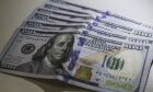 Dólar cai para R$ 5,24 em dia de ajuste no câmbio
