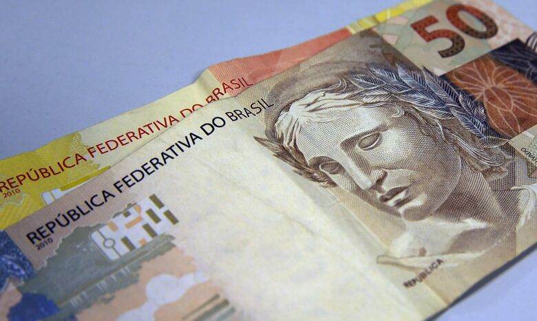 Valor médio pago neste mês será de R$ 217,18 - Crédito: Marcello Casal Jr / Agência Brasil