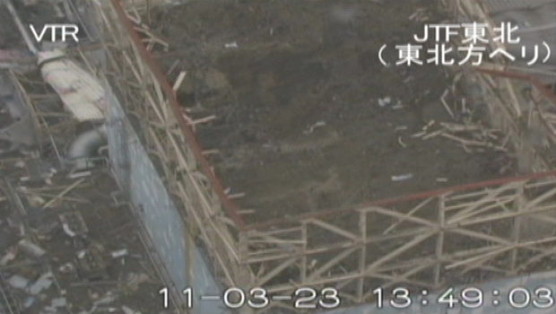 Prédio destruído do reator 1 é visto na quarta-feira - Crédito: Foto: AP